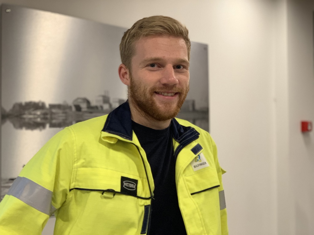 portrait of young man, posing, beard, yellow jacket