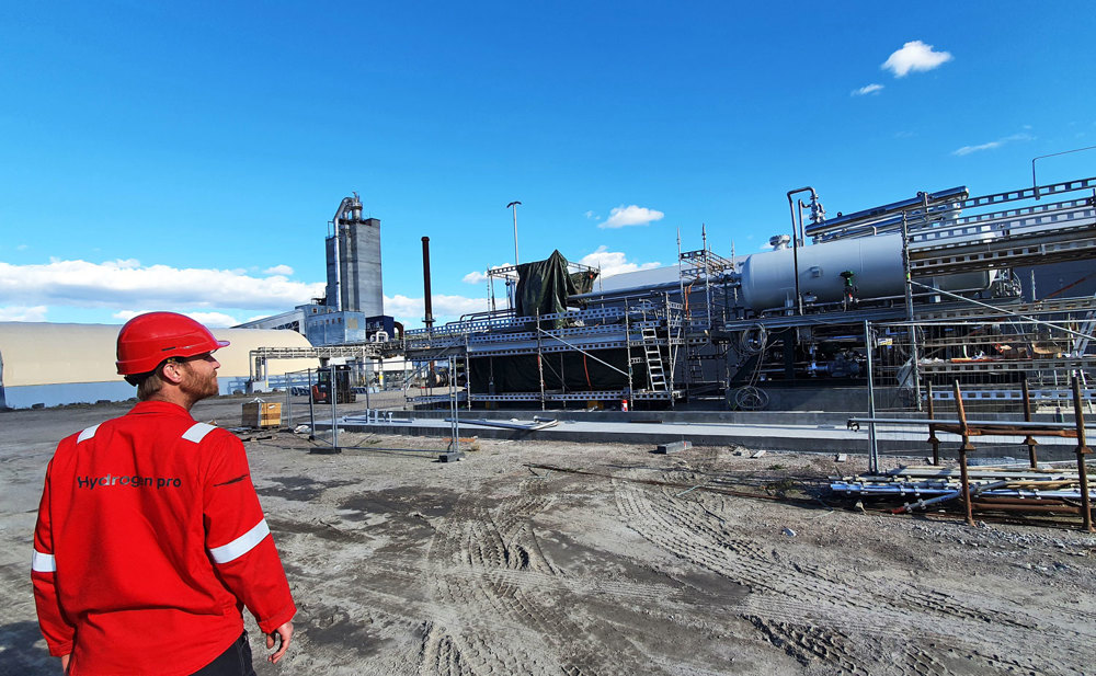 man walking towards test facilities