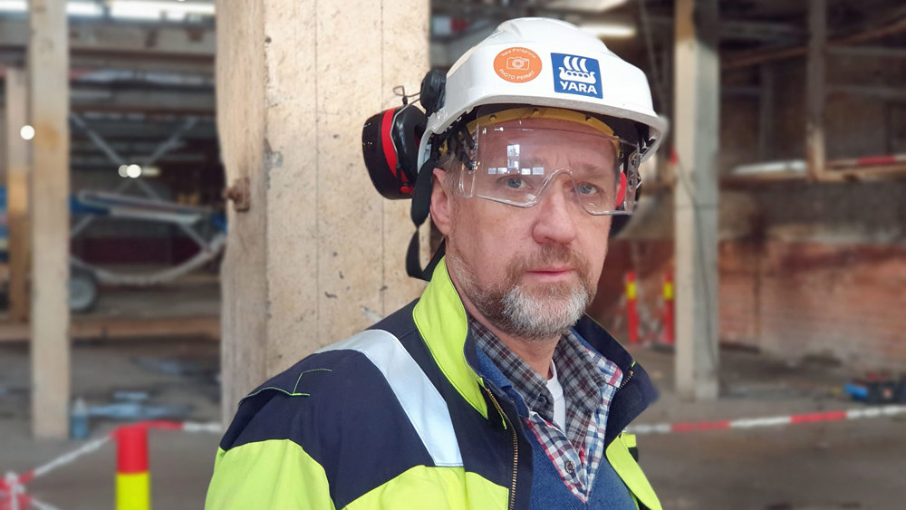 portrait of man, beard, goggles, white helmet