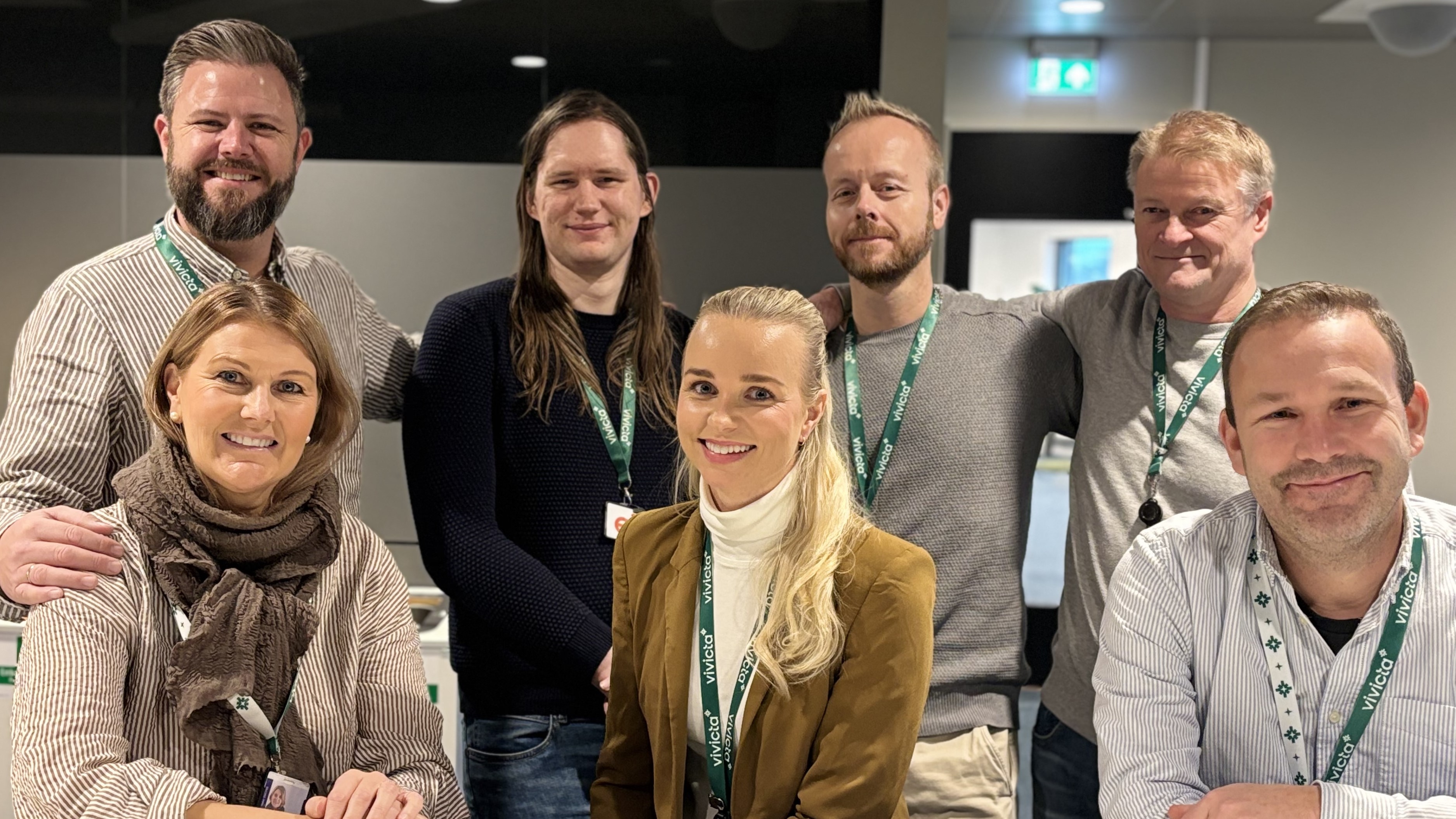 group photo, 7 persons, office environment