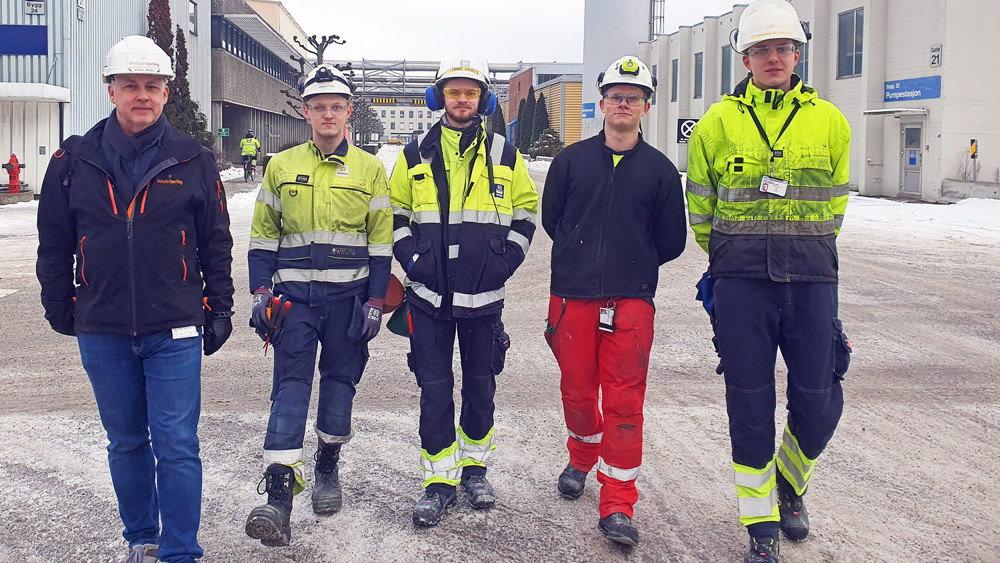 five men walking towards camera, posing, industry, working clothes